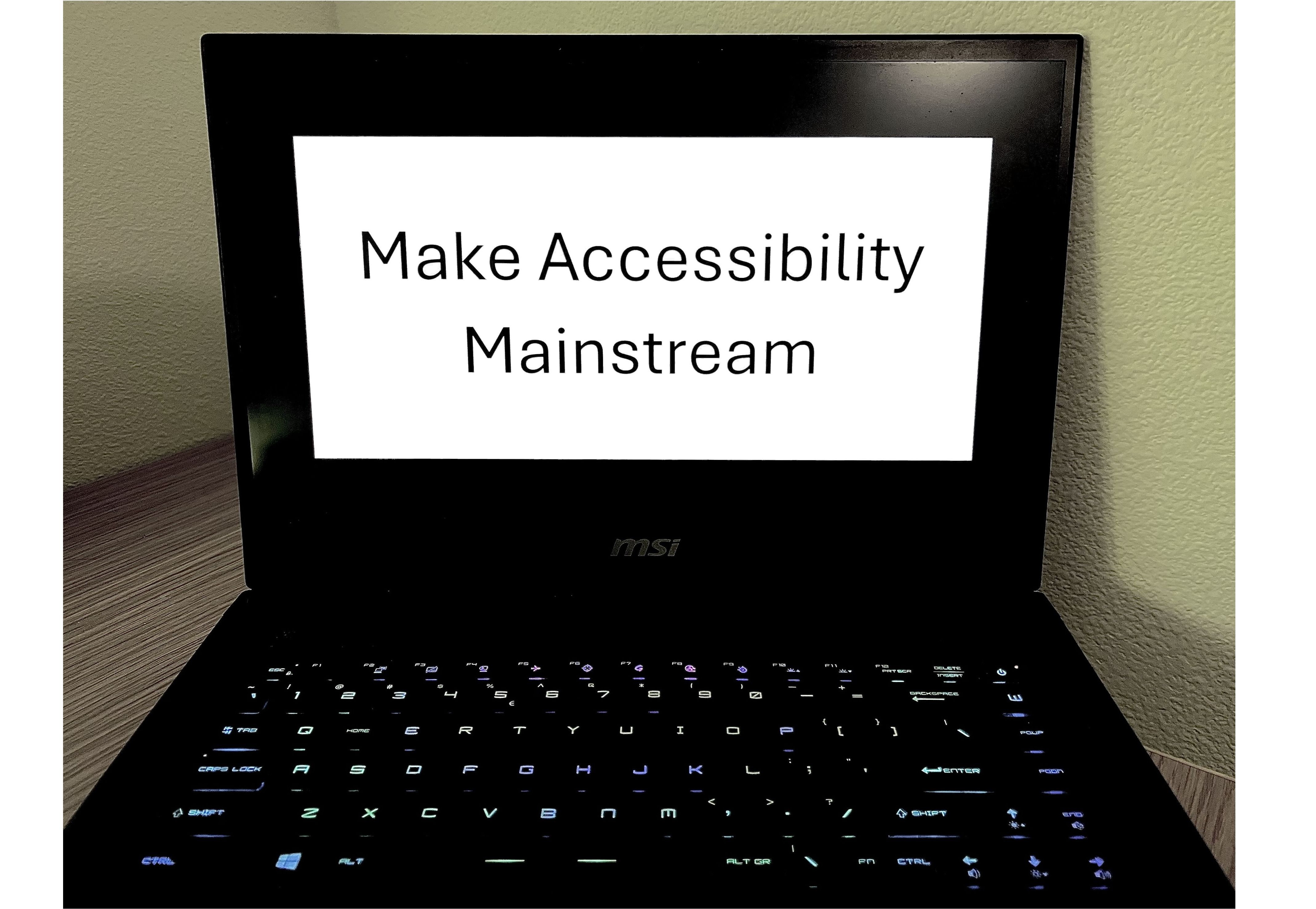 Computer with the words Make Accessibility Mainstream on the screen